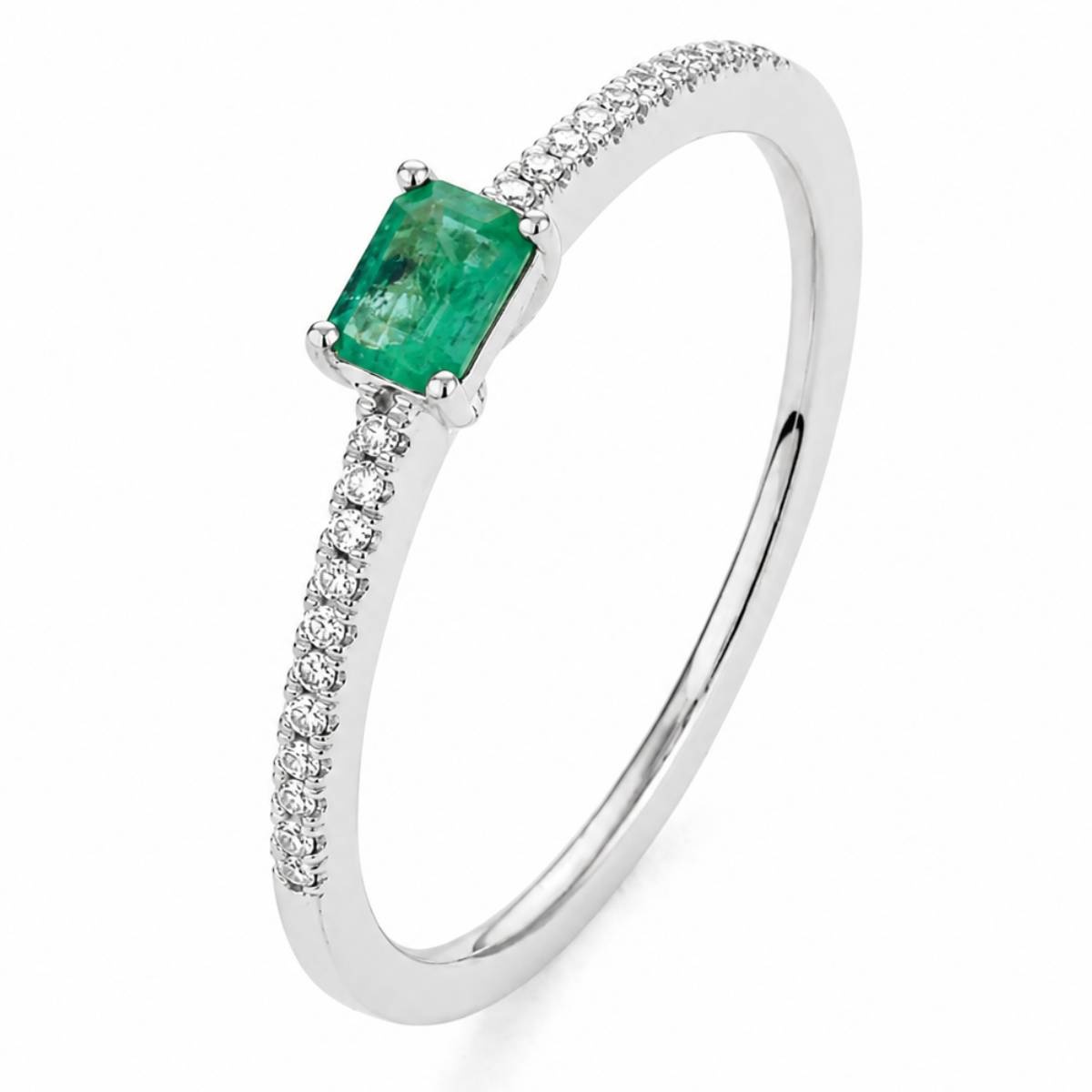 Anillo de oro blanco de 18K con esmeralda 0,22 cts (4x3 mm) y 22 diamantes en talla brillante con un total de 0,06 cts
