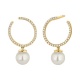 Pendientes Largos de oro amarillo de 18 Kt con diamantes de 0,20 ct