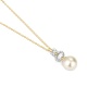 Colgante Largo de oro de 18 Kt con diamantes de 0,07 ct