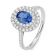 Anillo de oro blanco de 18 Kt con piedra de color y diamantes de 0,40 a 0,50 ct