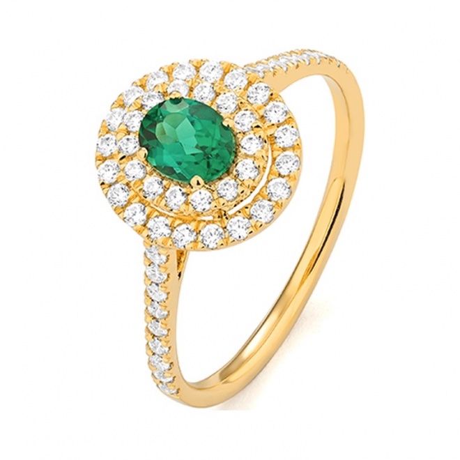 Anillo de oro amarillo de 18 Kt con piedra de color y diamantes de 0,40 a 0,50 ct