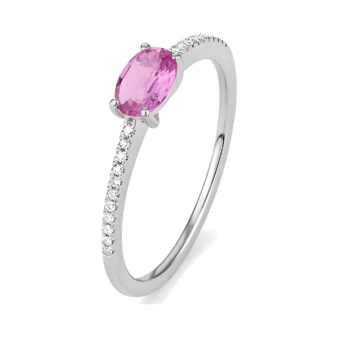 Anillo de oro blanco de 18 Kt con piedra de color y diamantes de 0,06 ct