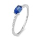 Anillo de oro blanco de 18 Kt con piedra de color y diamantes de 0,06 ct