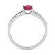 Anillo de oro blanco de 18 Kt con piedra de color y diamantes de 0,06 ct