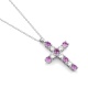 Colgante Cruz de oro blanco de 18 Kt con piedra de color y diamantes de 0,47 ct
