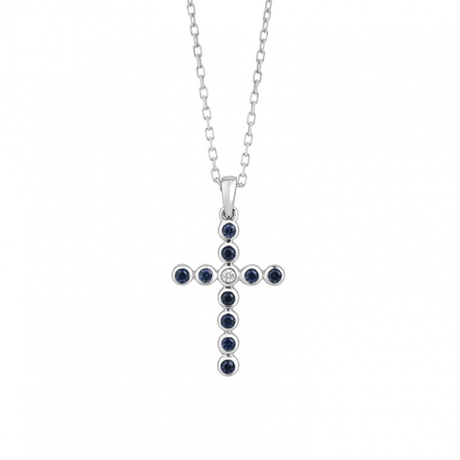 Colgante Cruz de oro blanco de 18 Kt con zafiro de 0,15 ct y diamante de 0,01 ct
