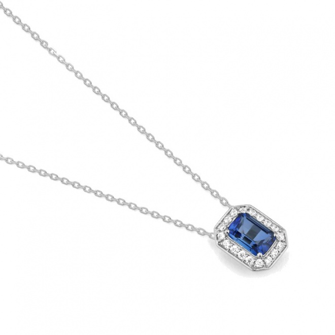 Colgante de oro blanco de 18 Kt con piedra de color y diamantes de 0,12 a 0,19 ct