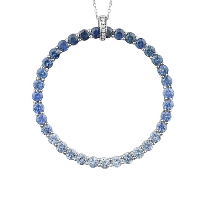 Colgante de oro blanco de 18 Kt con piedra de color y diamantes de 0,02 ct