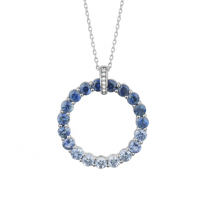 Colgante de oro blanco de 18 Kt con piedra de color y diamantes de 0,02 ct