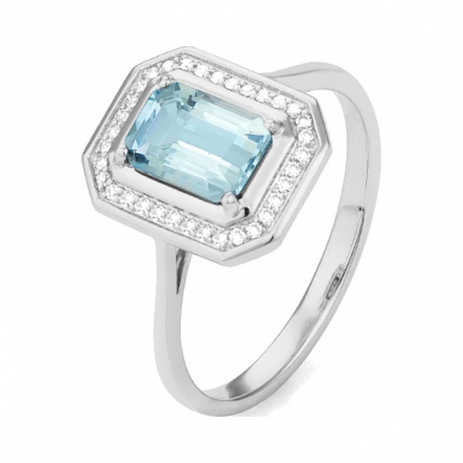 Anillo de oro blanco de 18 Kt con piedra de color y diamantes de 0,10 ct