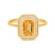 Anillo de oro amarillo de 18 Kt con piedra de color y diamantes de 0,10 ct