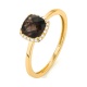 Anillo Rosetón de oro amarillo de 18 Kt con piedra de color y diamantes de 0,05 ct