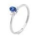Anillo de oro blanco de 18 Kt con piedra de color y diamantes de 0,05 ct